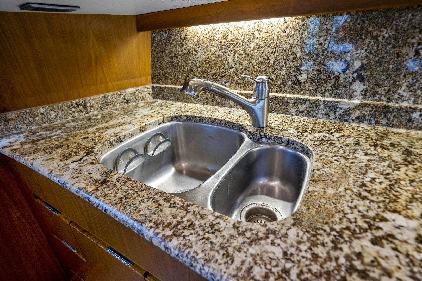 a sink in a kitchen aboard LAST CALL Yacht for Sale