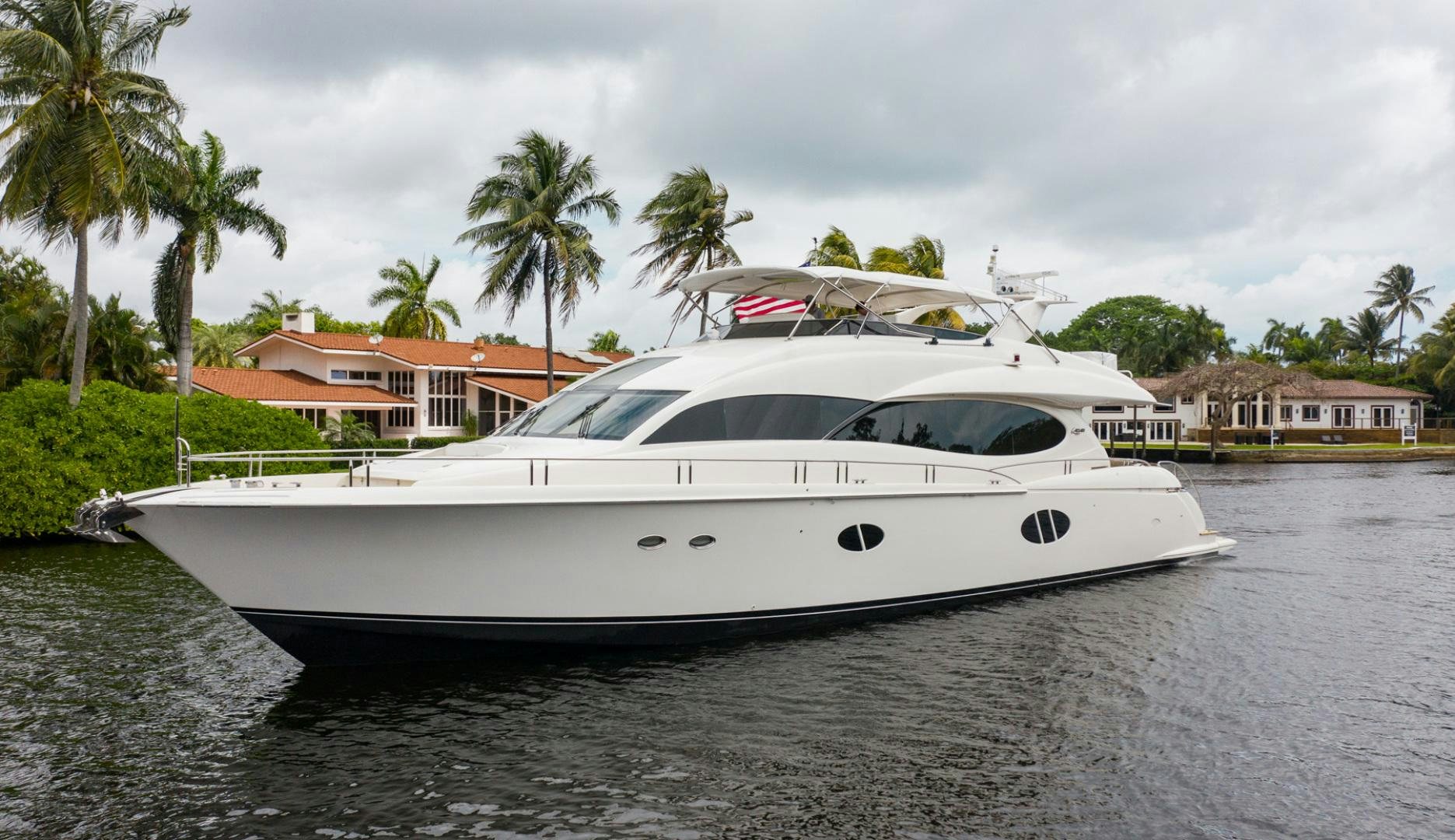 a white yacht on a body of water aboard 26 NORTH Yacht for Sale