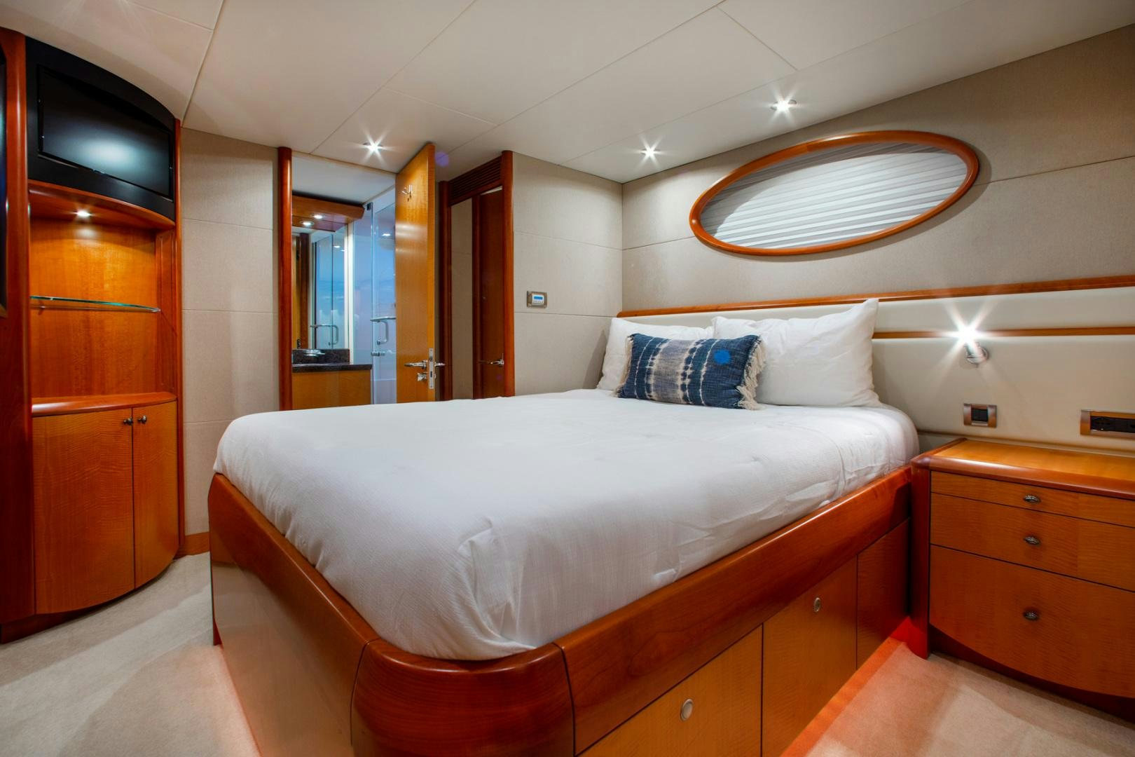 a bed in a room aboard 26 NORTH Yacht for Sale