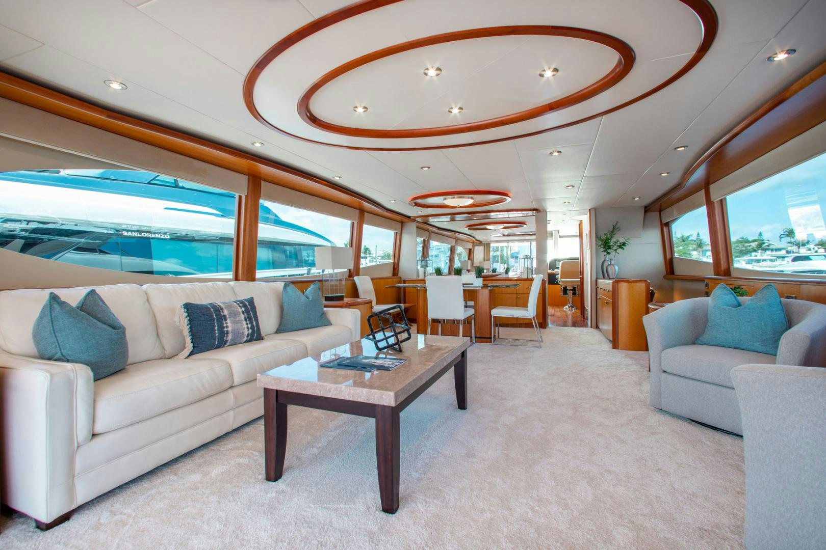 a living room with a large open window aboard 26 NORTH Yacht for Sale