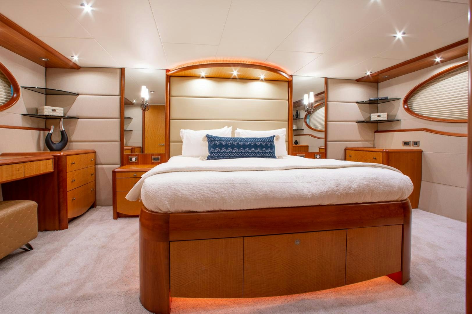 a bed in a room aboard 26 NORTH Yacht for Sale