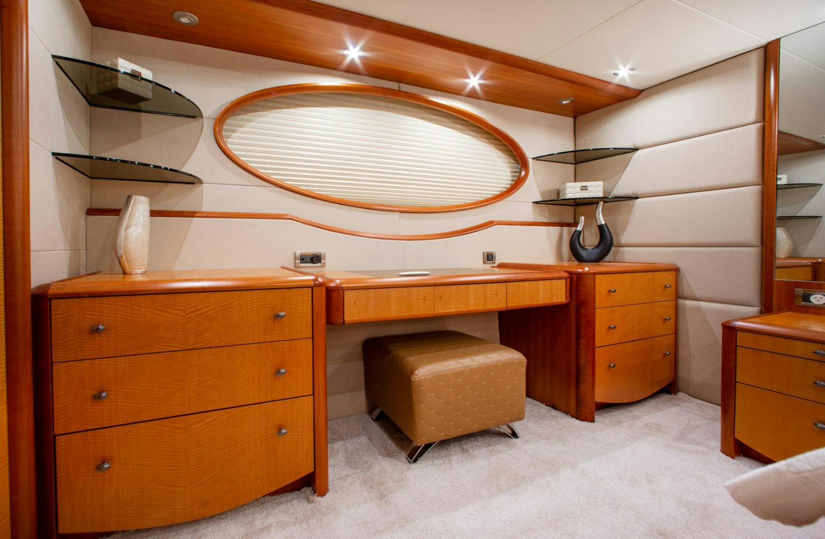 a room with a desk and a bed aboard 26 NORTH Yacht for Sale