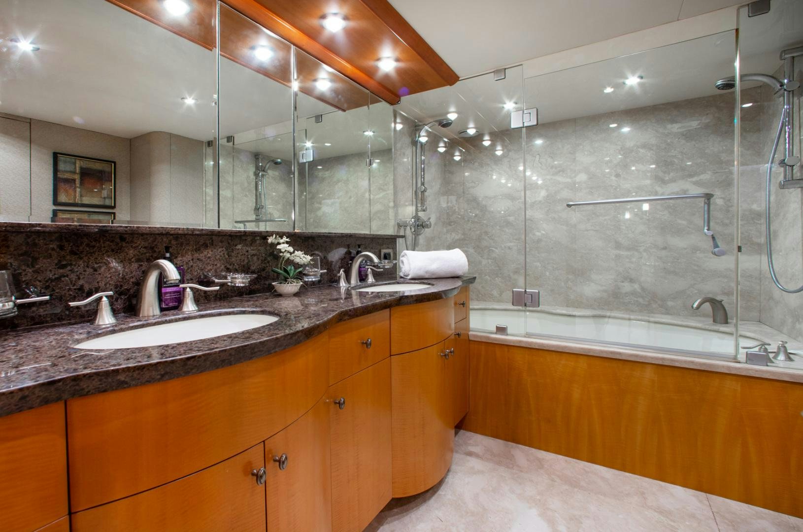 a large bathroom with a large sink aboard 26 NORTH Yacht for Sale