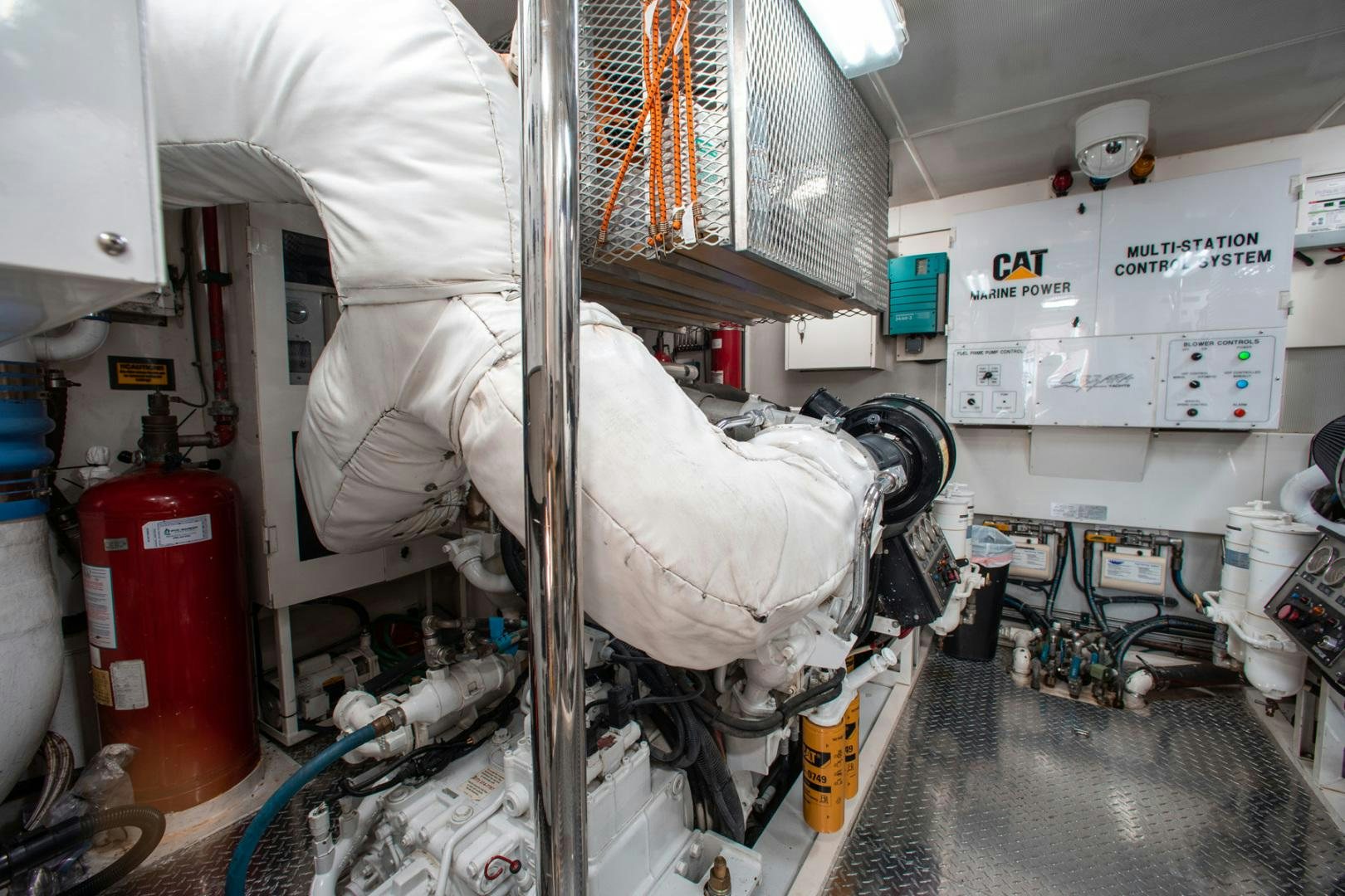 a person in a white coat aboard 26 NORTH Yacht for Sale