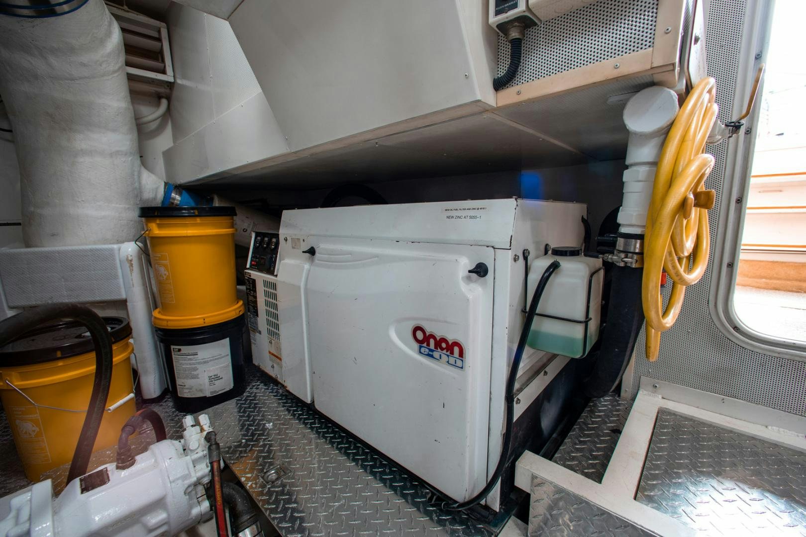 a white machine in a room aboard 26 NORTH Yacht for Sale