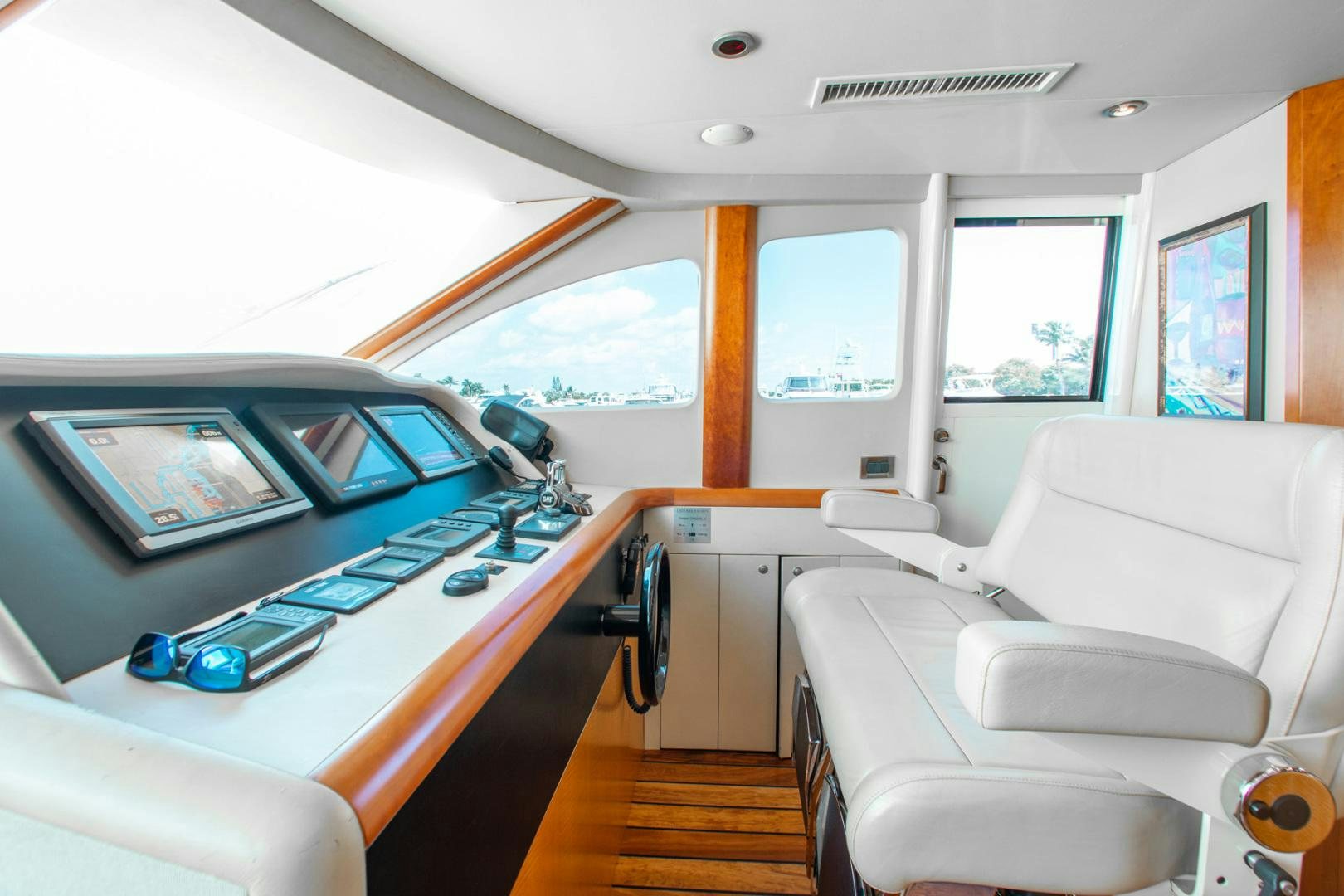 a room with a desk and a laptop aboard 26 NORTH Yacht for Sale