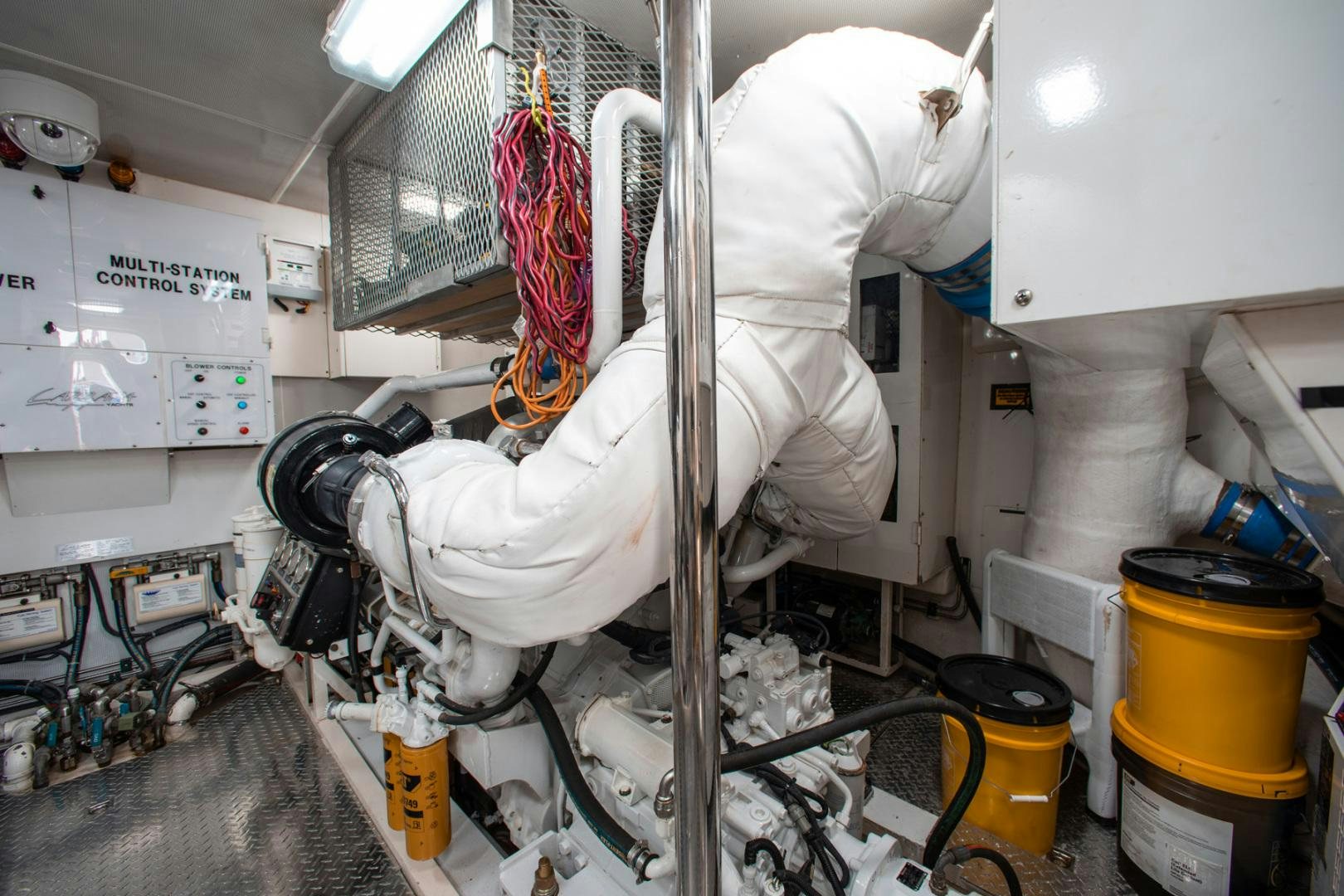 a person in a white suit aboard 26 NORTH Yacht for Sale