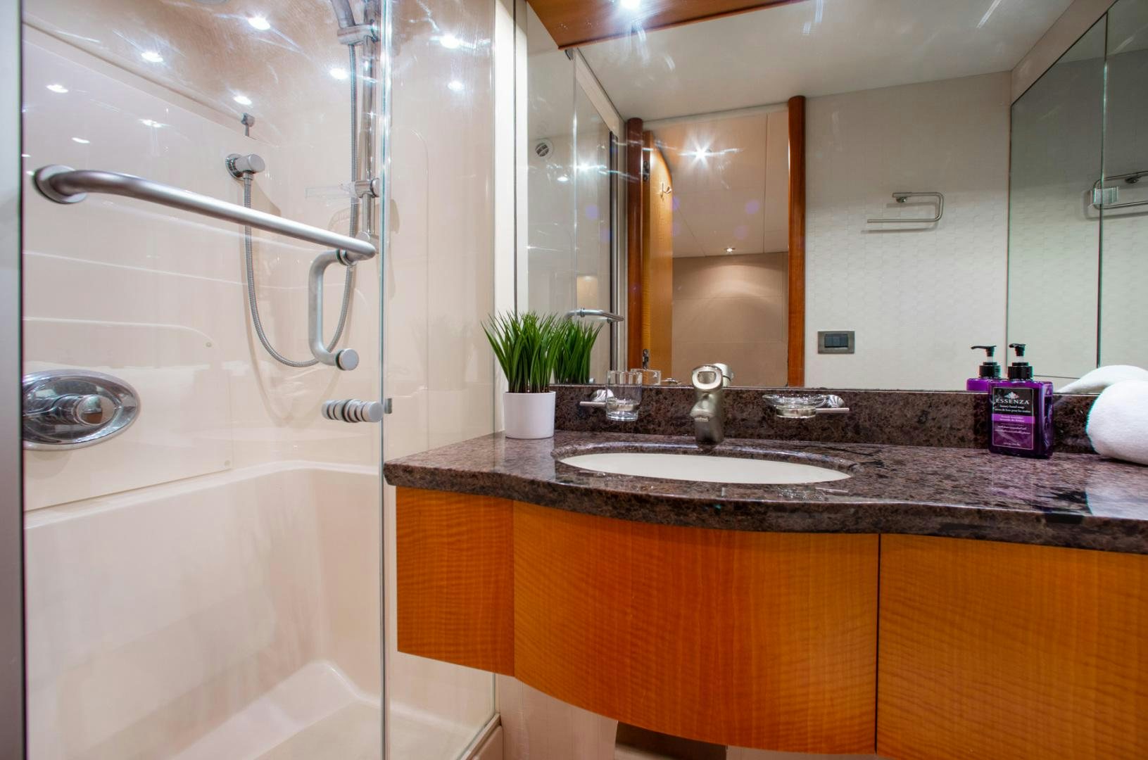 a bathroom with a sink and a shower aboard 26 NORTH Yacht for Sale