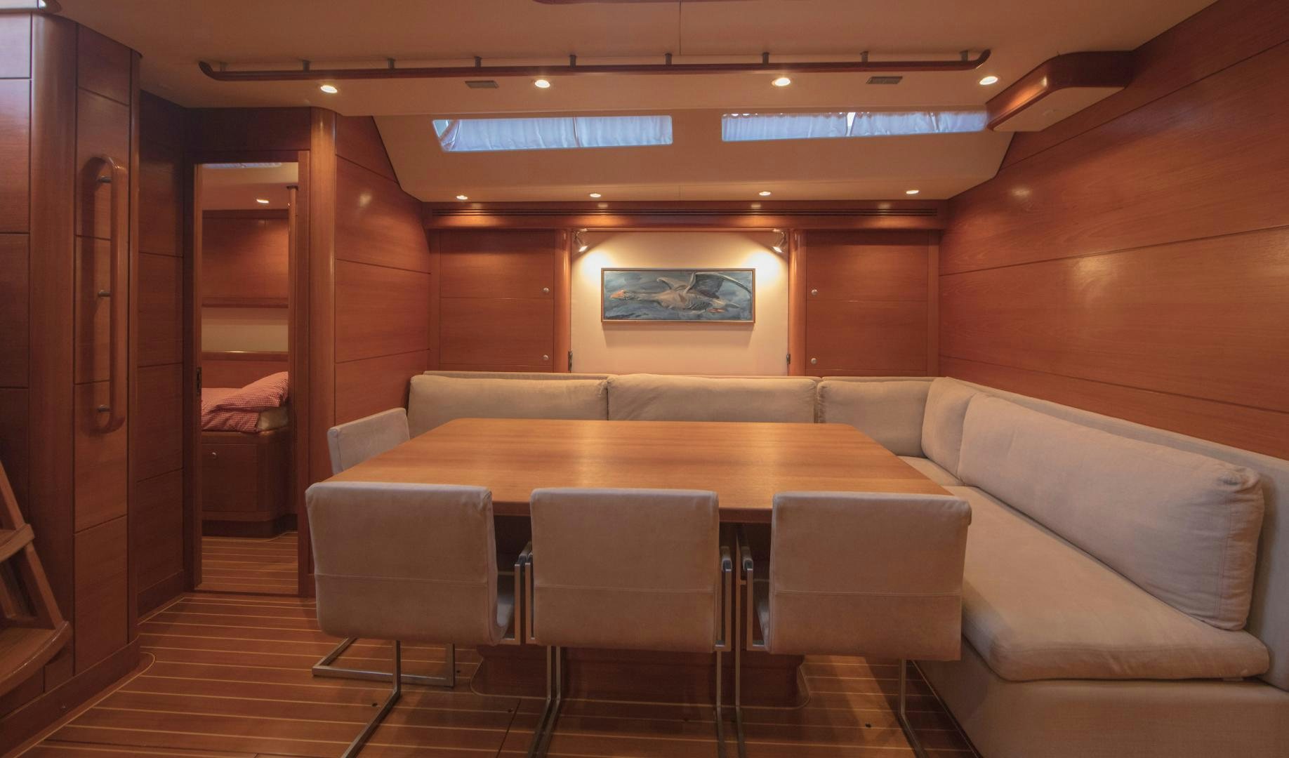 a room with a couch and chairs aboard GREY GOOSE Yacht for Sale