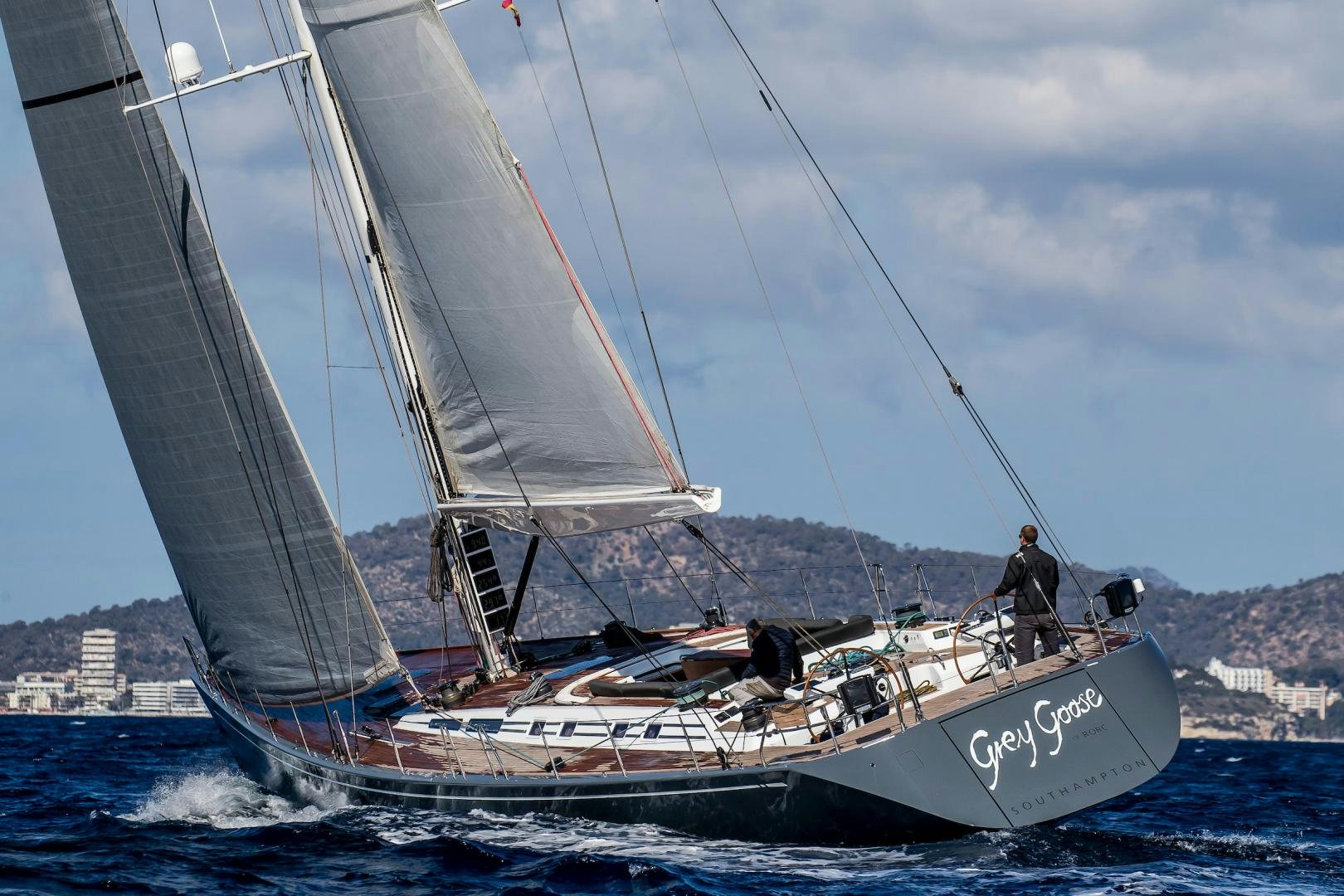 a person sailing on a sailboat aboard GREY GOOSE Yacht for Sale