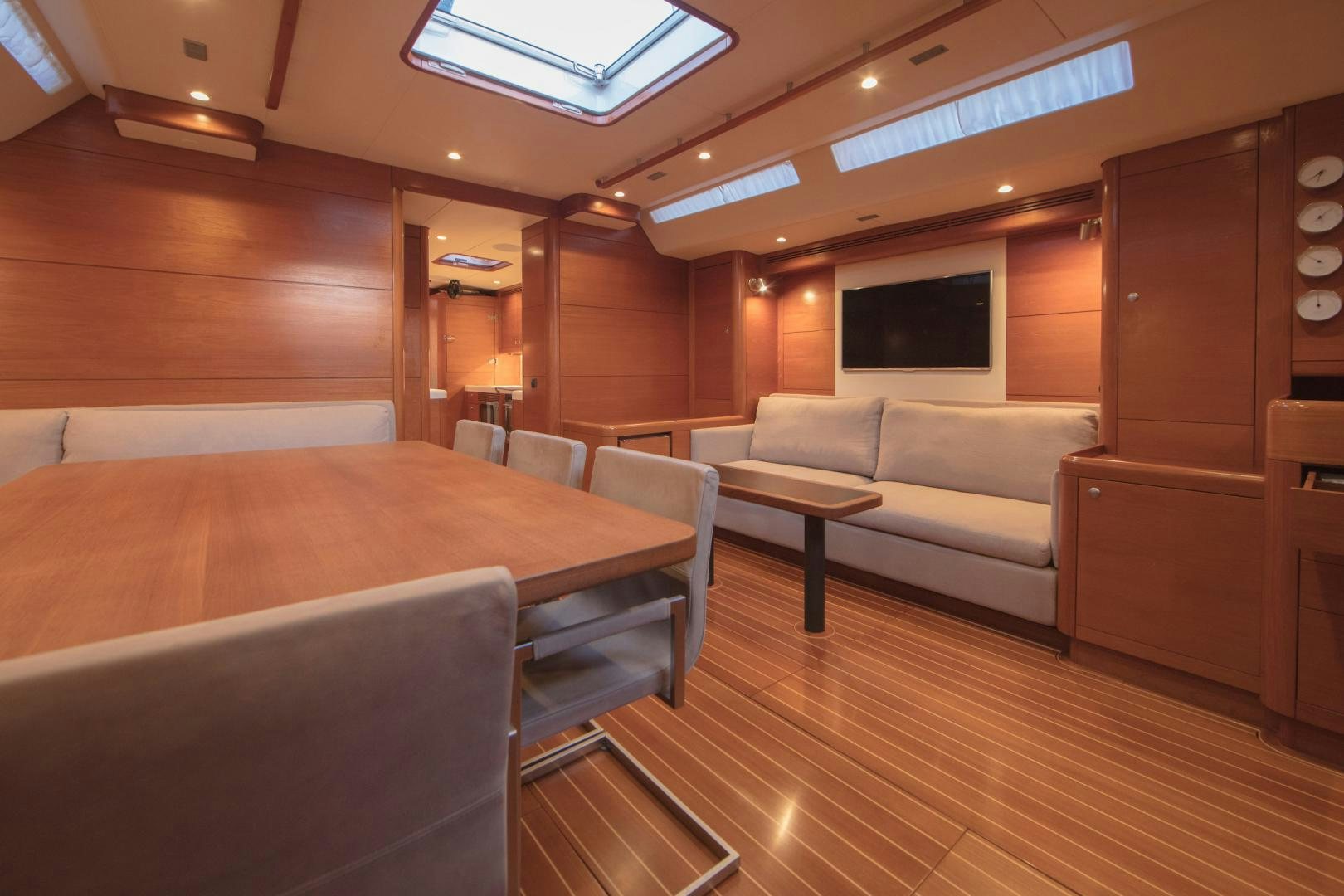 a room with a bed and a couch aboard GREY GOOSE Yacht for Sale
