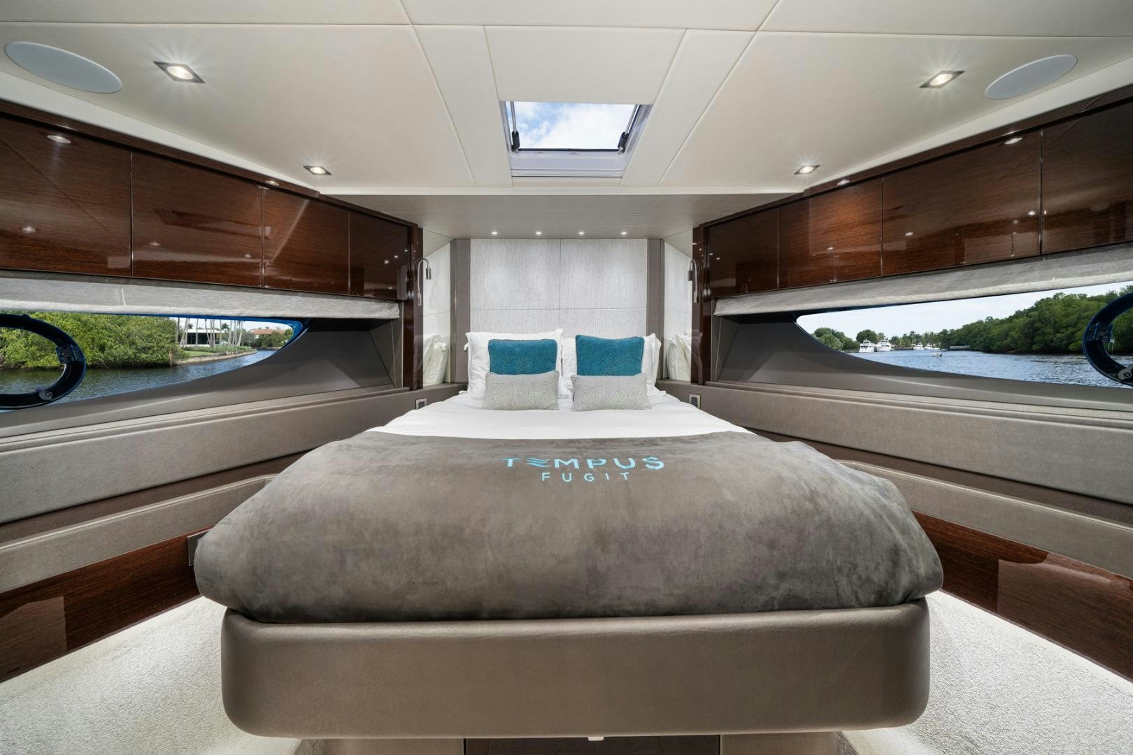 a large bed in a car aboard TEMPUS FUGIT Yacht for Sale