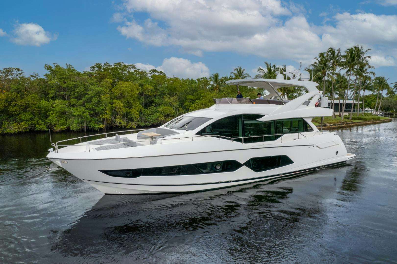 a white yacht on the water aboard TEMPUS FUGIT Yacht for Sale