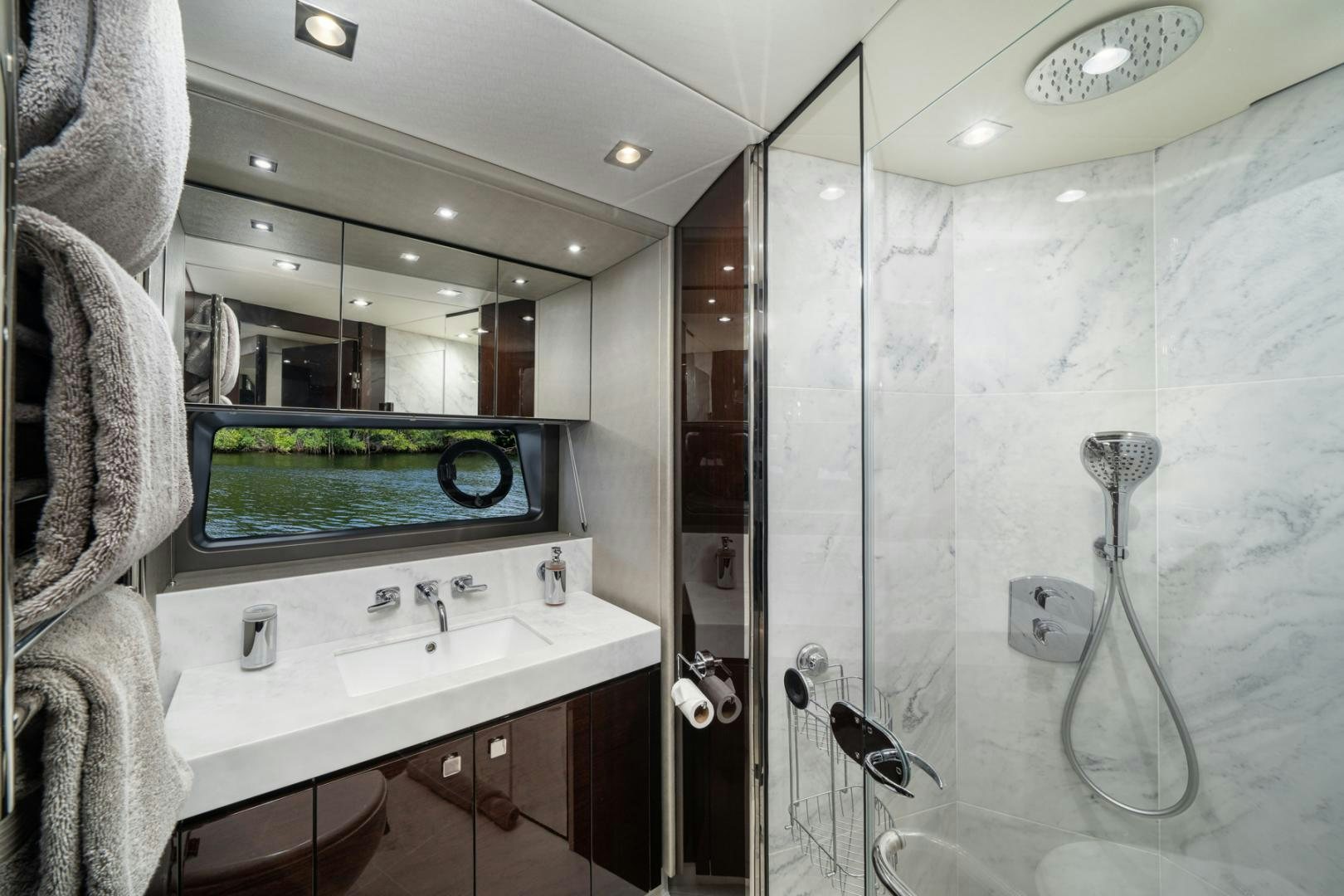 a bathroom with a glass shower aboard TEMPUS FUGIT Yacht for Sale