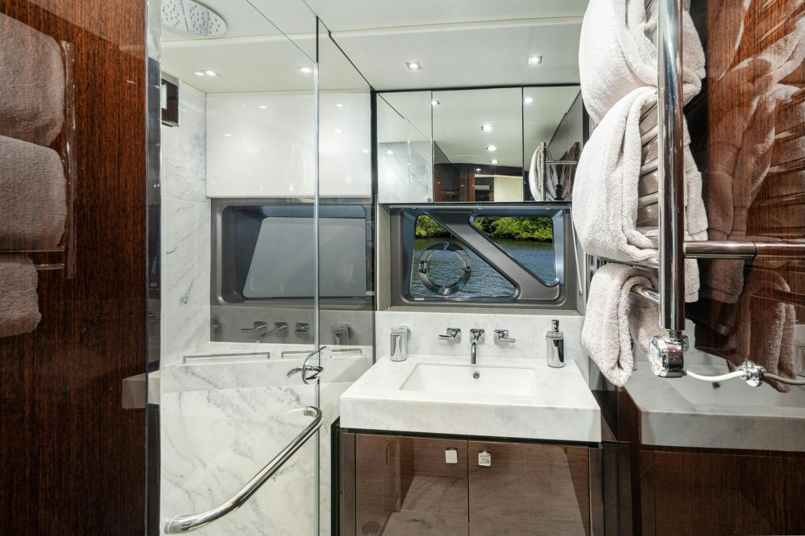 a bathroom with a sink and a microwave aboard TEMPUS FUGIT Yacht for Sale
