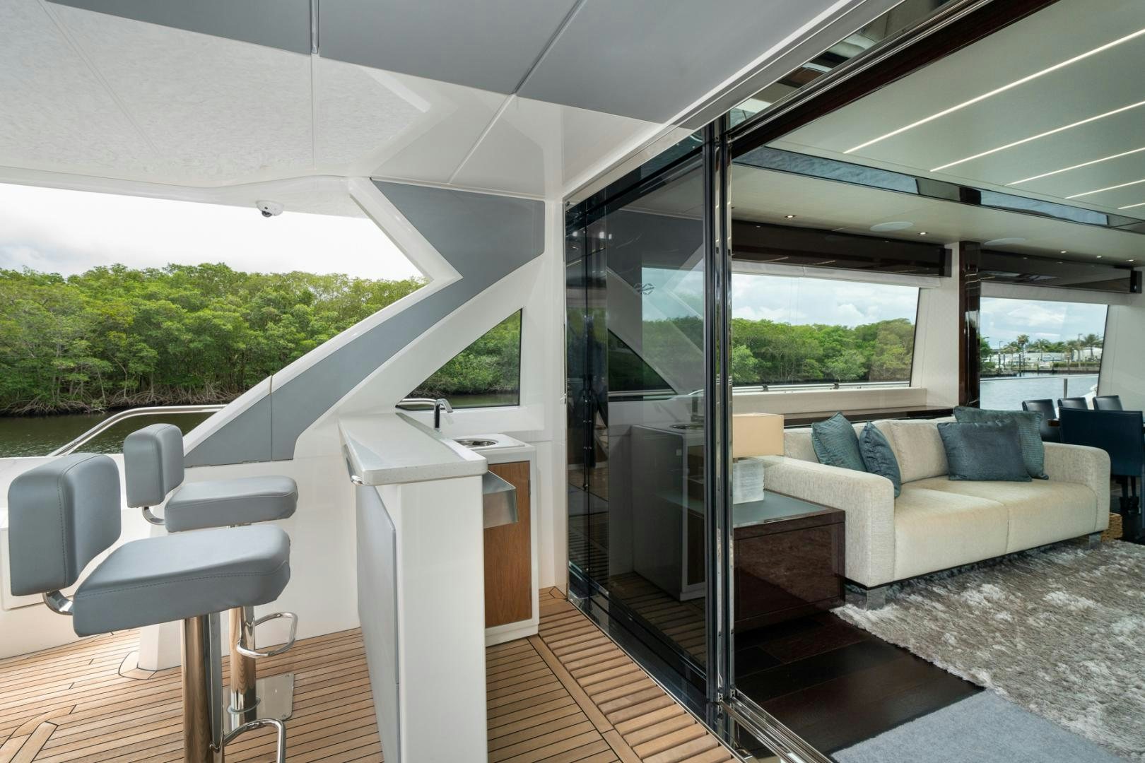 a room with a glass door aboard TEMPUS FUGIT Yacht for Sale