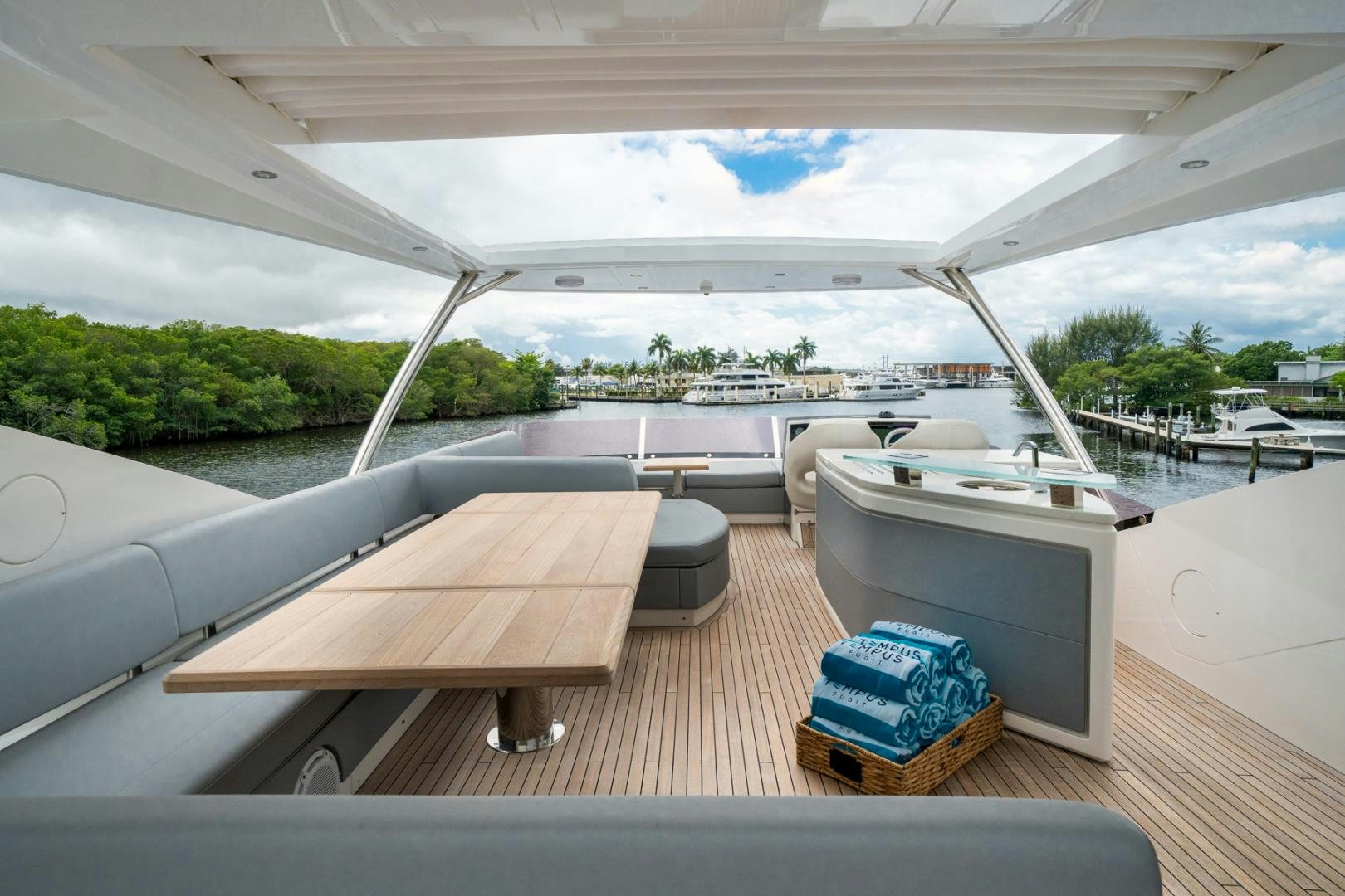 a room with a table and chairs aboard TEMPUS FUGIT Yacht for Sale