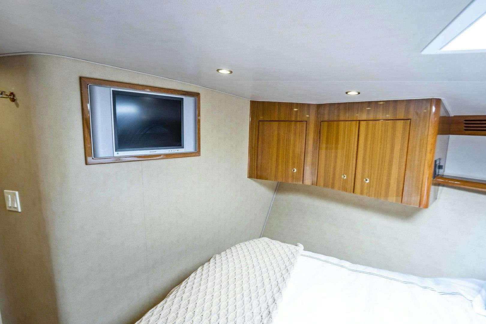 a tv on a wall aboard TRANQUILO Yacht for Sale