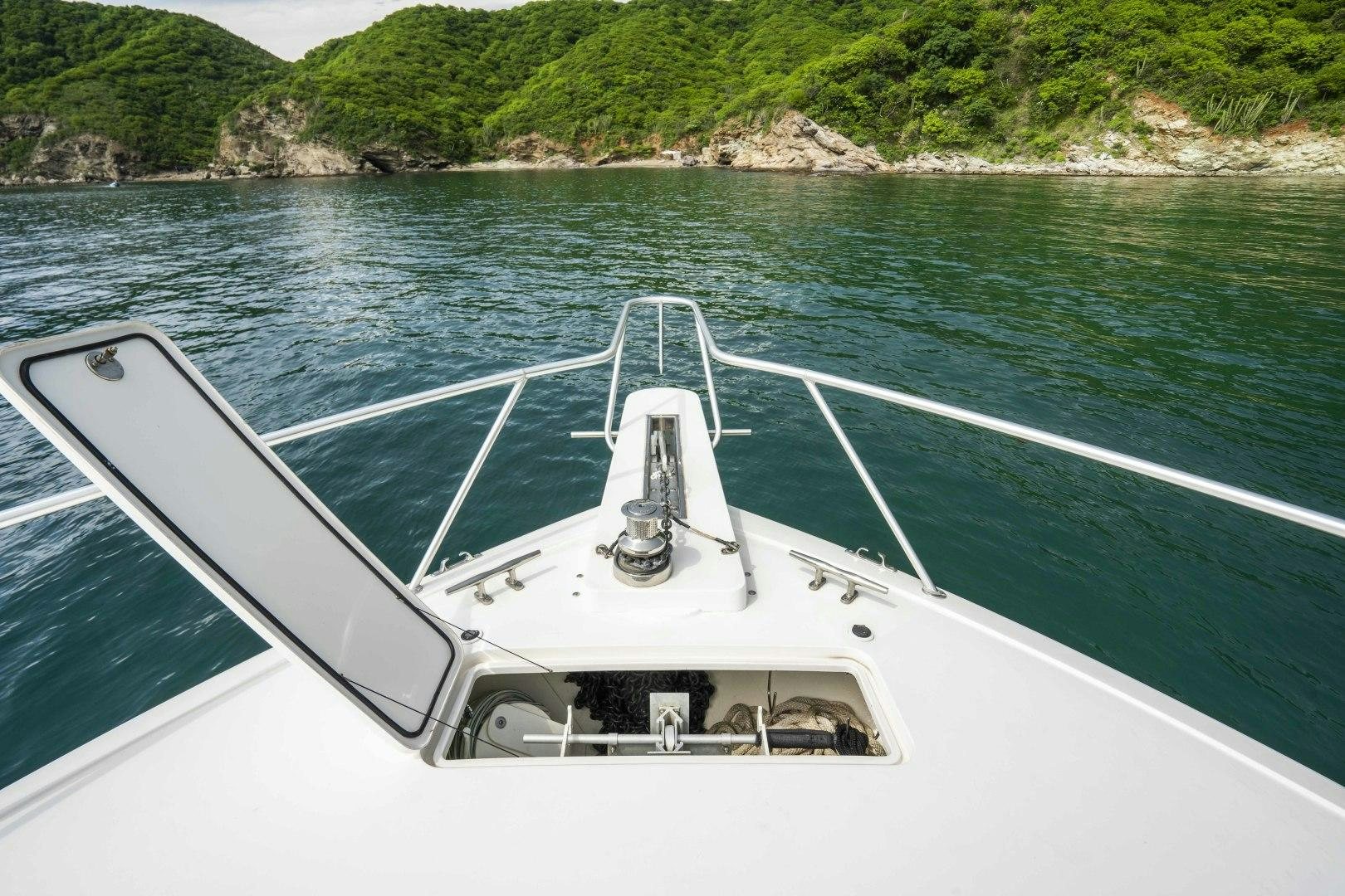 a boat on the water aboard TRANQUILO Yacht for Sale