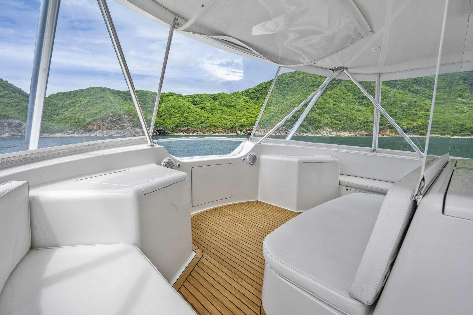 a boat with a white canopy aboard TRANQUILO Yacht for Sale
