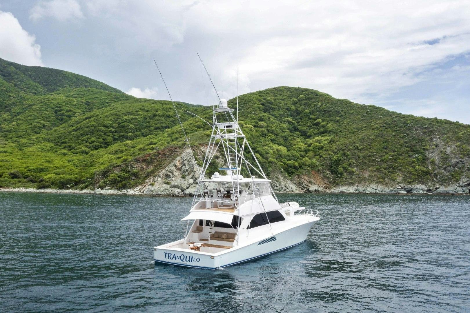 a boat on the water aboard TRANQUILO Yacht for Sale