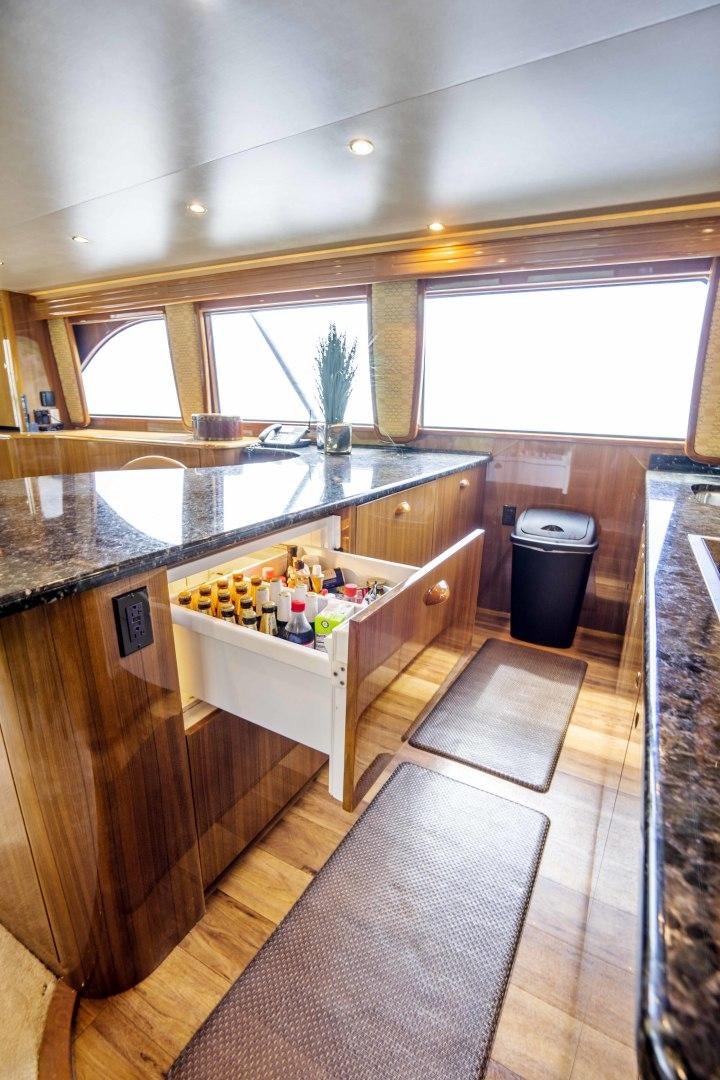 a kitchen with a countertop sink aboard TRANQUILO Yacht for Sale