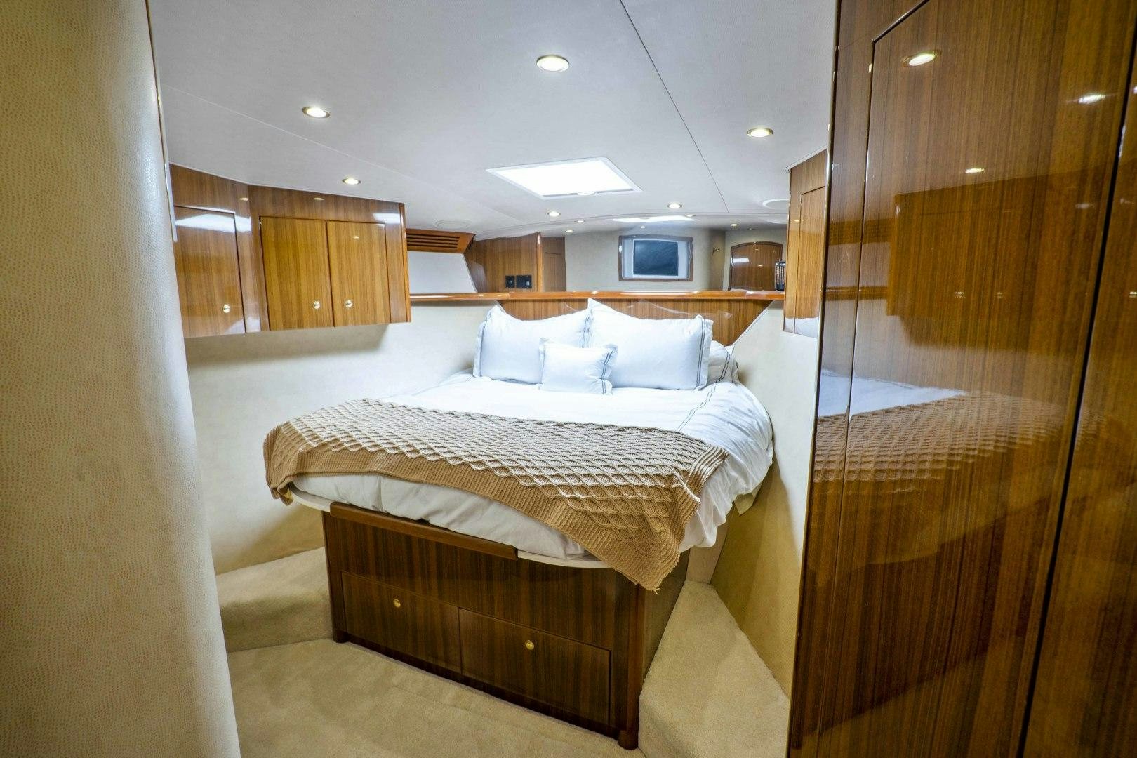 a bed in a room aboard TRANQUILO Yacht for Sale