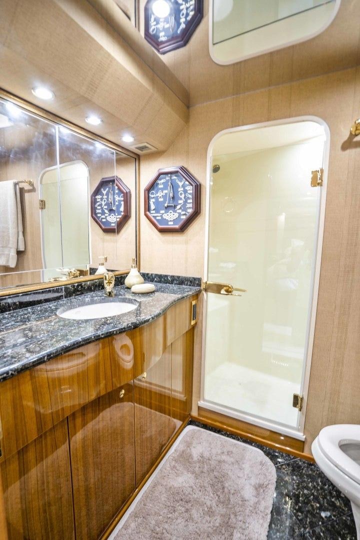 a bathroom with a marble counter top aboard TRANQUILO Yacht for Sale