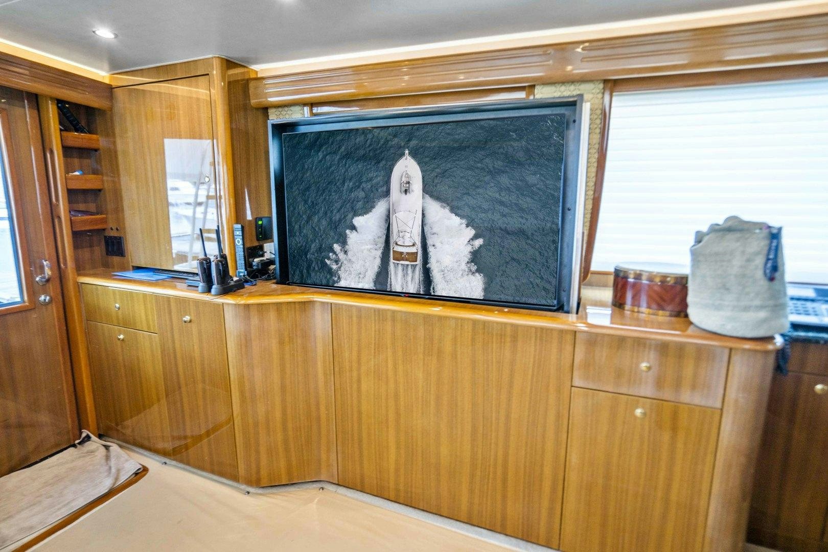 a tv on a cabinet aboard TRANQUILO Yacht for Sale