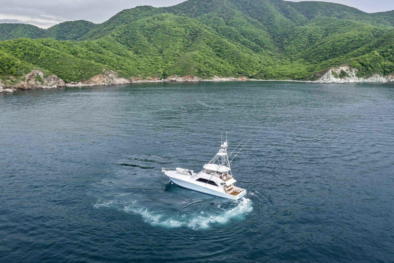 a boat sailing on the water aboard TRANQUILO Yacht for Sale