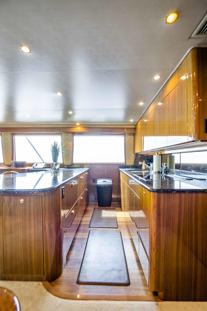 a kitchen with a large island aboard TRANQUILO Yacht for Sale