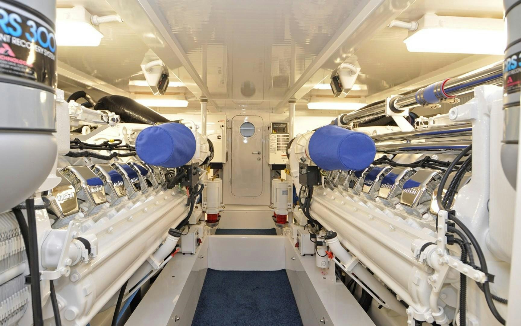 a room with white walls and blue balloons aboard ONE MORE DAY Yacht for Sale