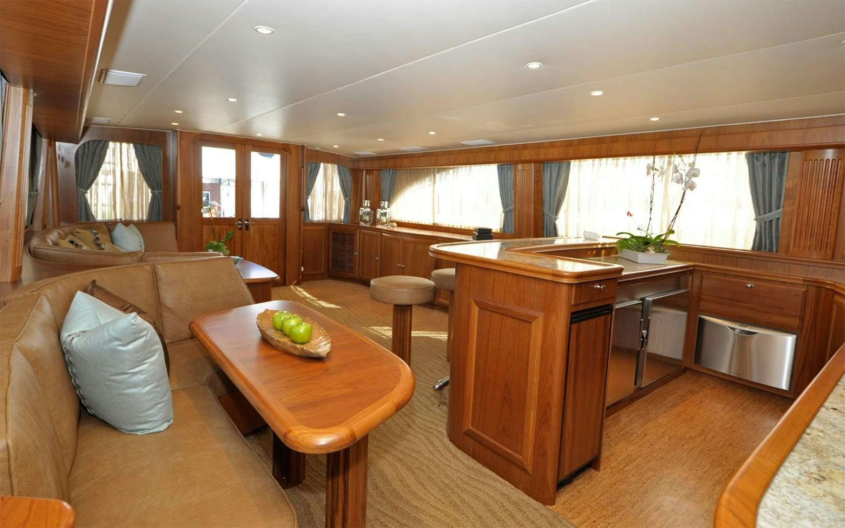 a living room with a couch and a table aboard ONE MORE DAY Yacht for Sale