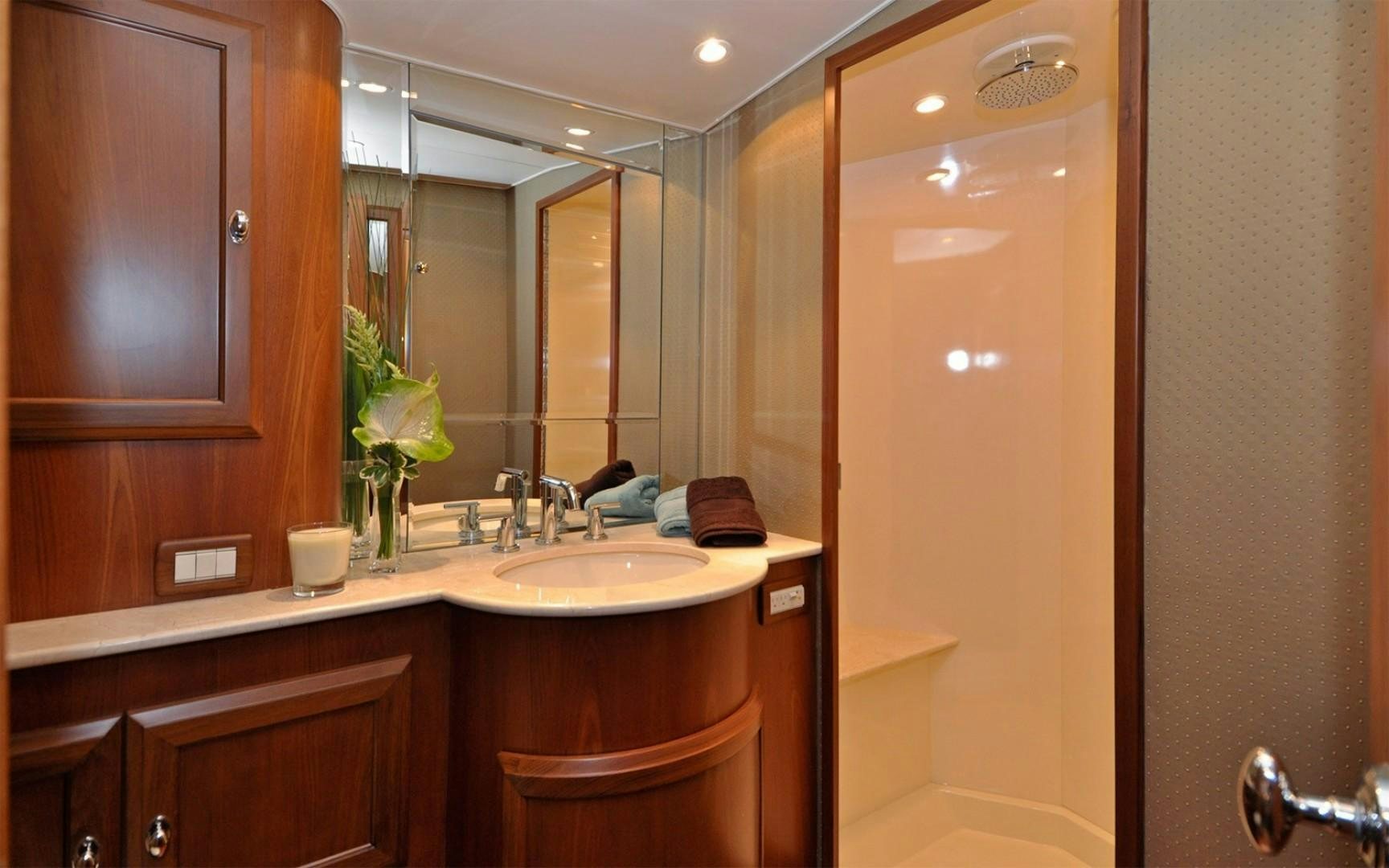 a bathroom with a large mirror aboard ONE MORE DAY Yacht for Sale