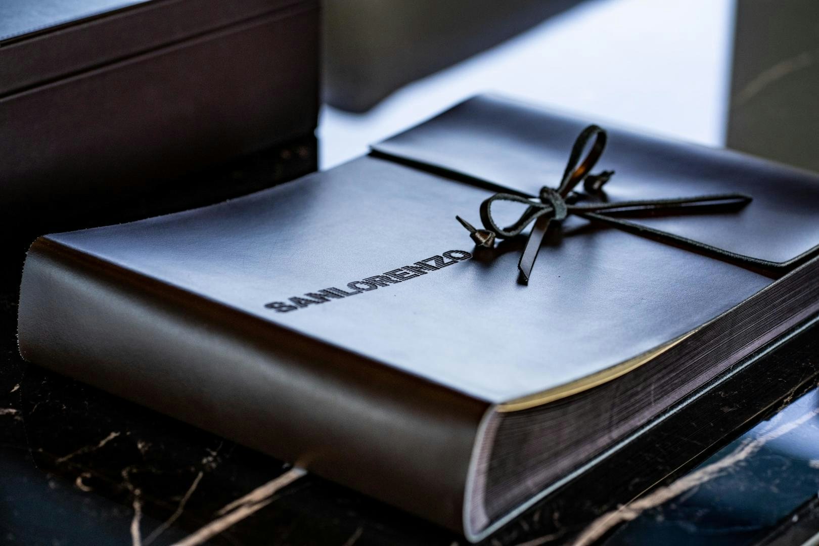 a close-up of a book aboard ACE Yacht for Sale