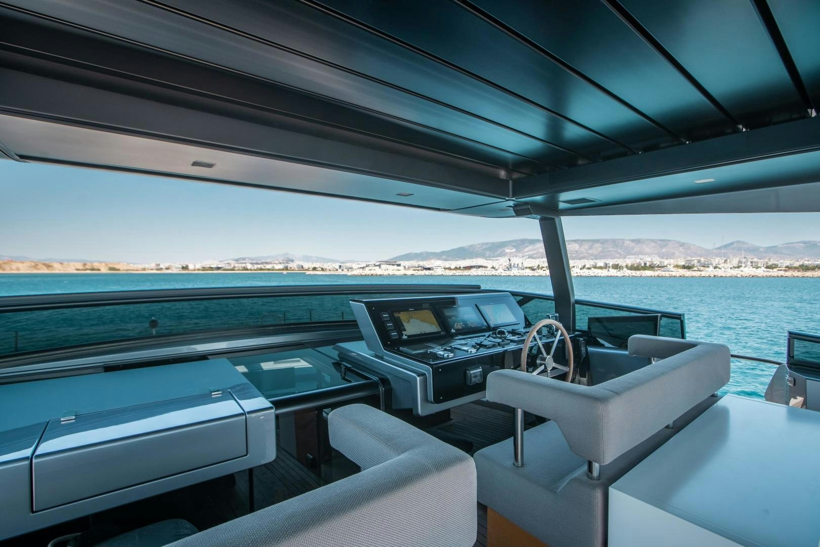 a car on a boat aboard ACE Yacht for Sale