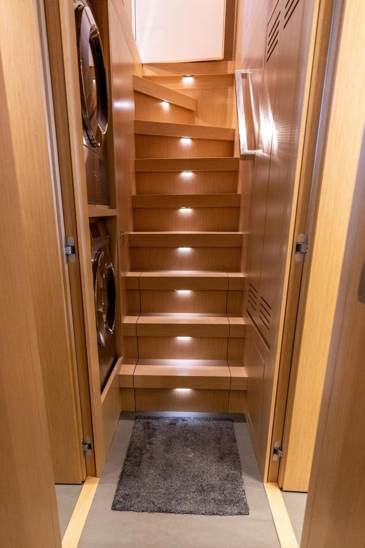 a wooden door with a glass door aboard ACE Yacht for Sale
