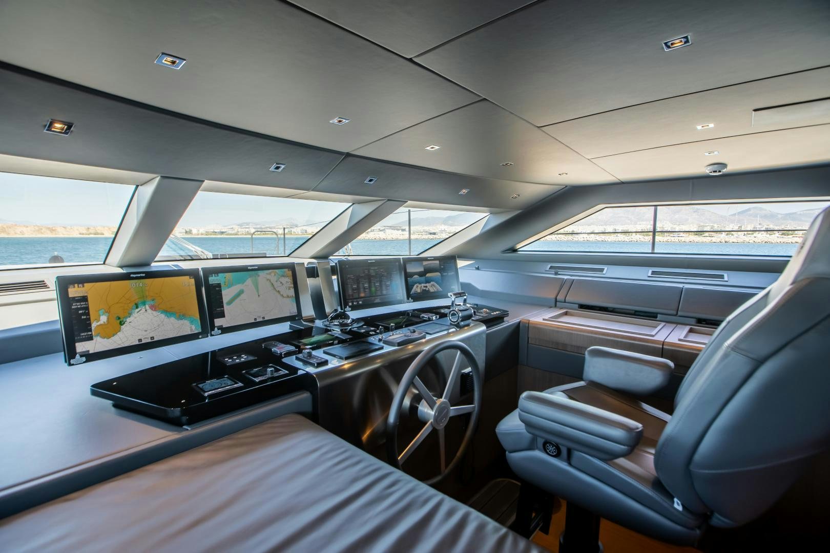 inside of a vehicle with monitors and monitors aboard ACE Yacht for Sale