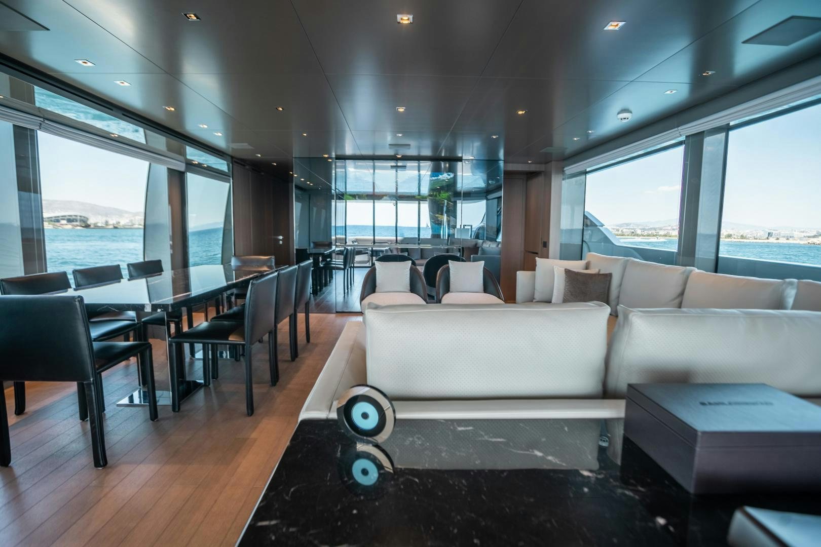 a living room with a large window aboard ACE Yacht for Sale