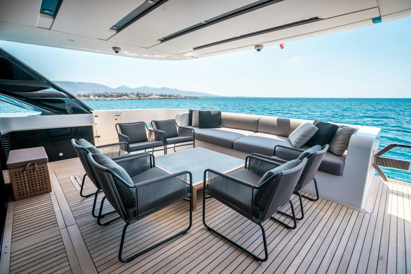 a large living room with a large patio and a large body of water aboard ACE Yacht for Sale