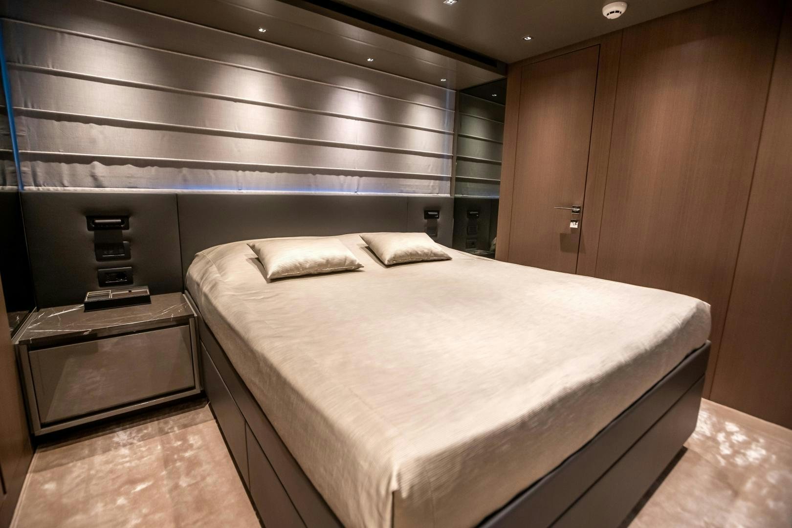 a bed in a room aboard ACE Yacht for Sale