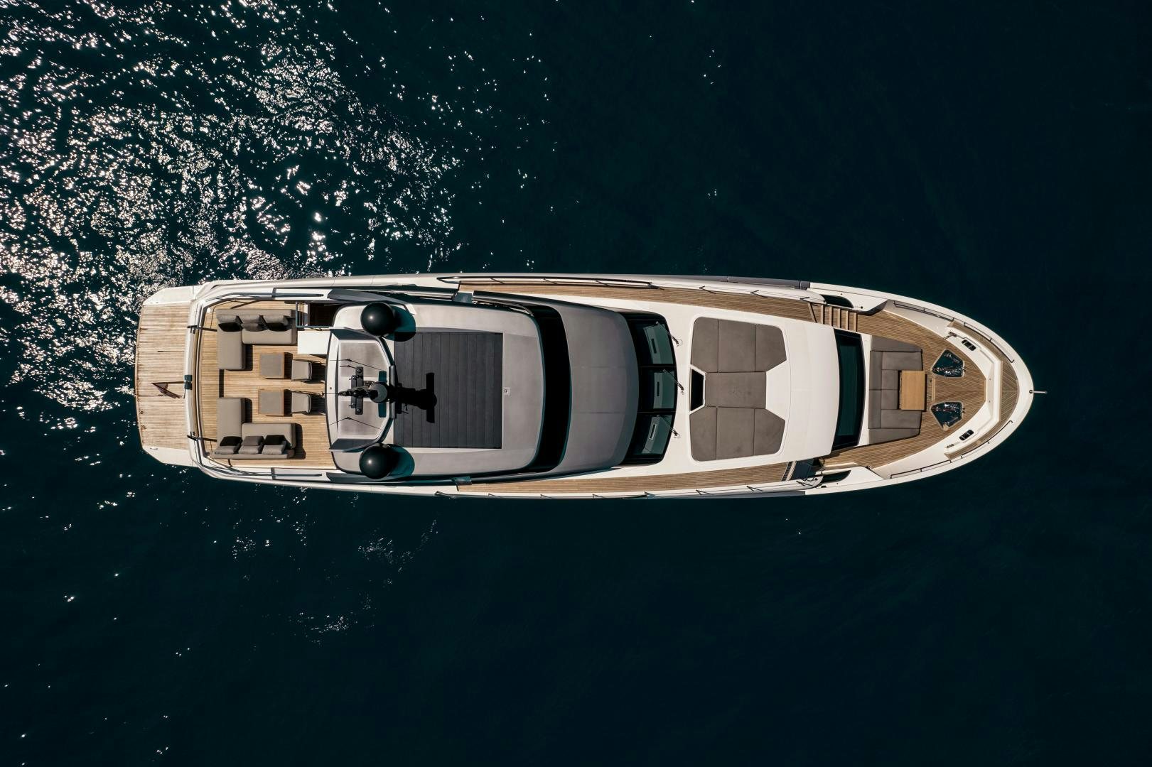 a white rectangular object with a black surface and a white circle on it aboard ACE Yacht for Sale