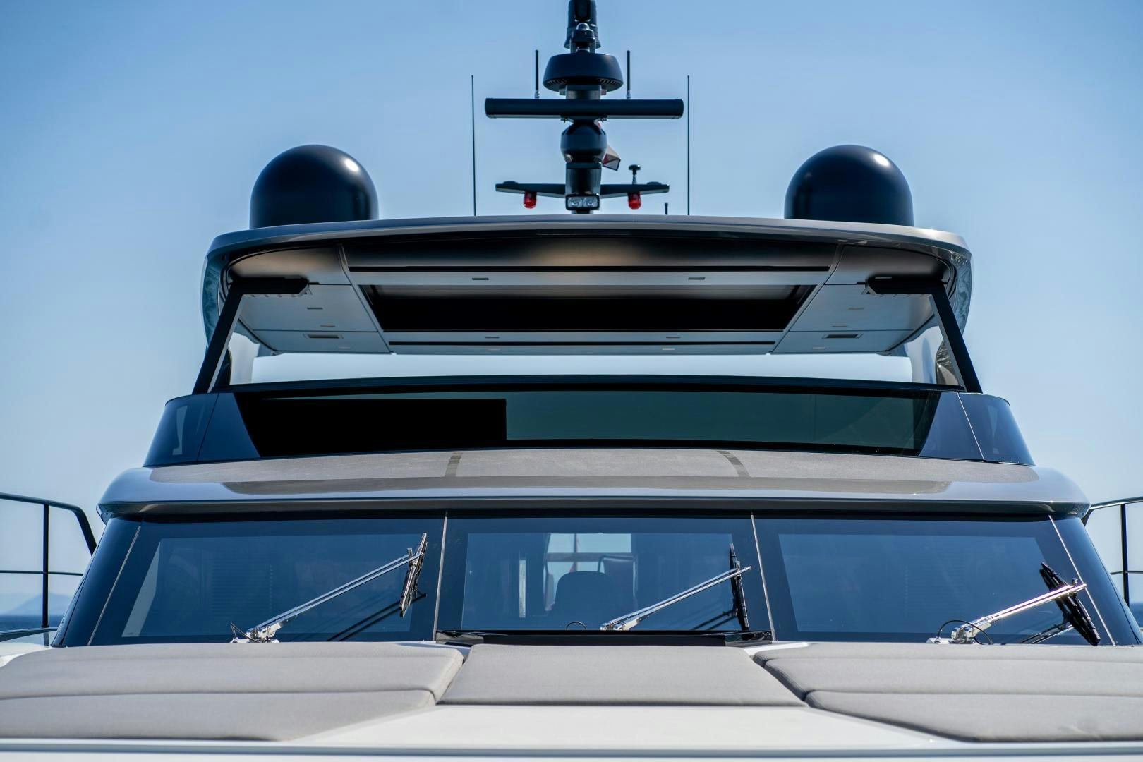 the front of a white car aboard ACE Yacht for Sale