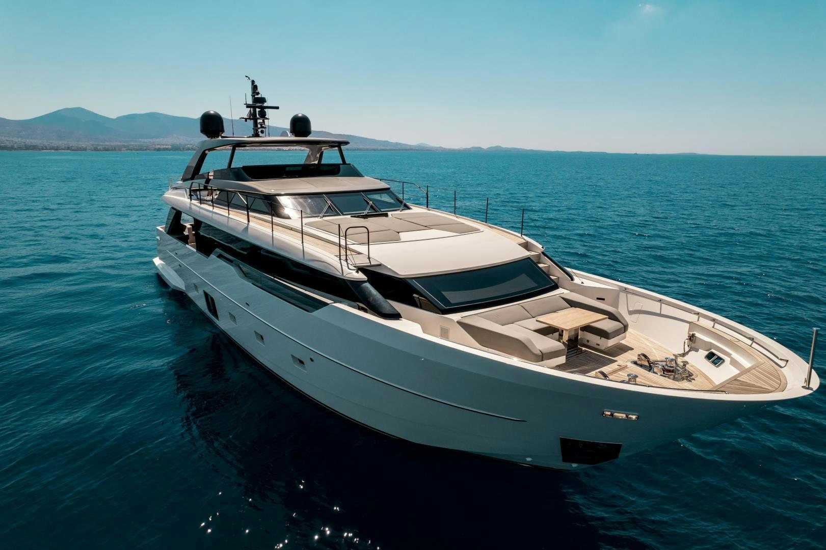 a white yacht in the water aboard ACE Yacht for Sale