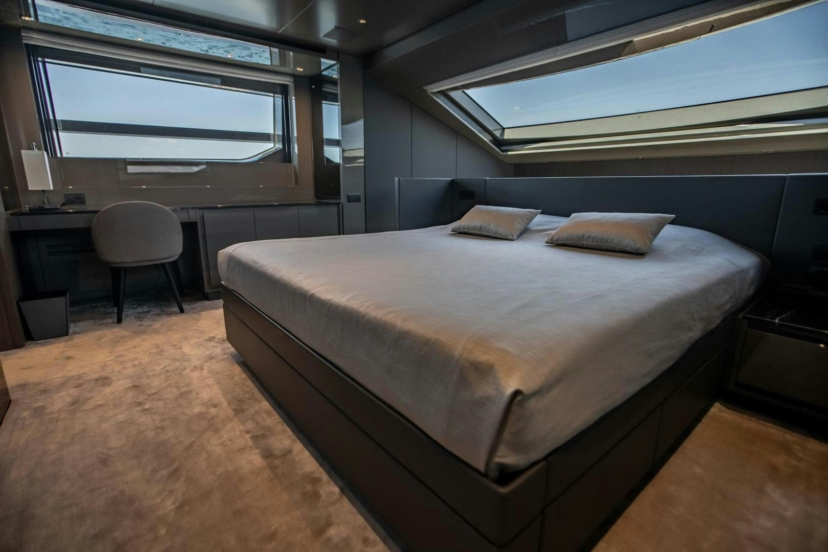 a bed in a room aboard ACE Yacht for Sale