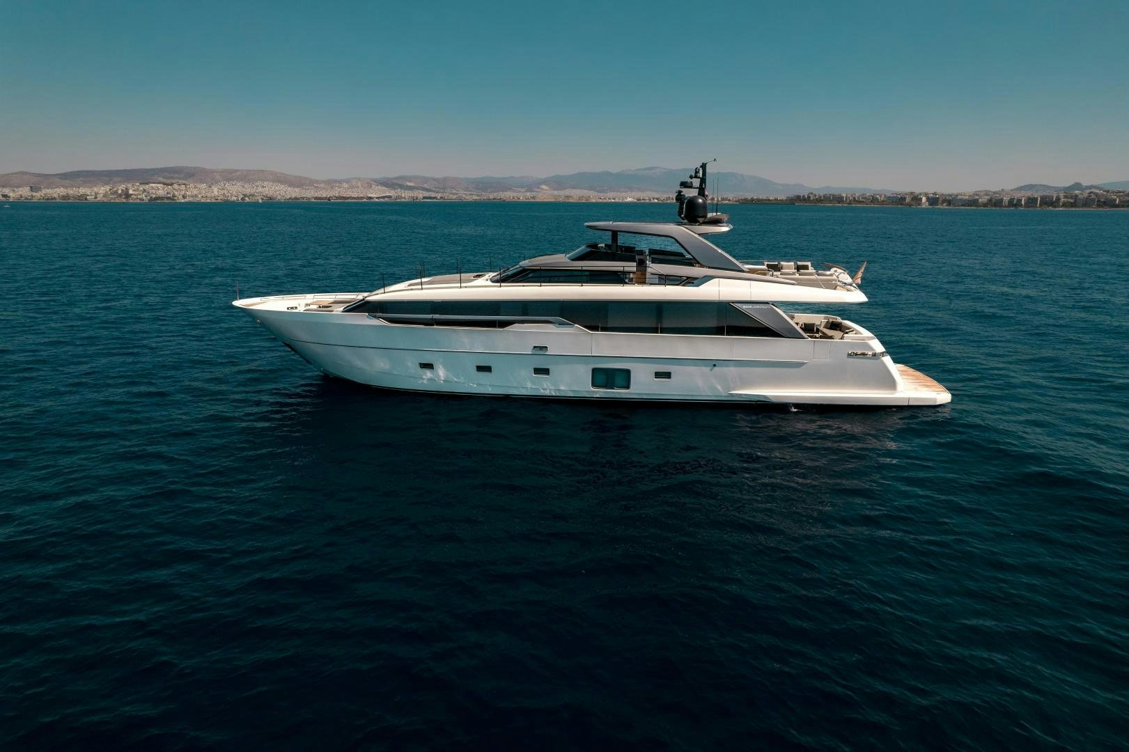 a white yacht in the water aboard ACE Yacht for Sale