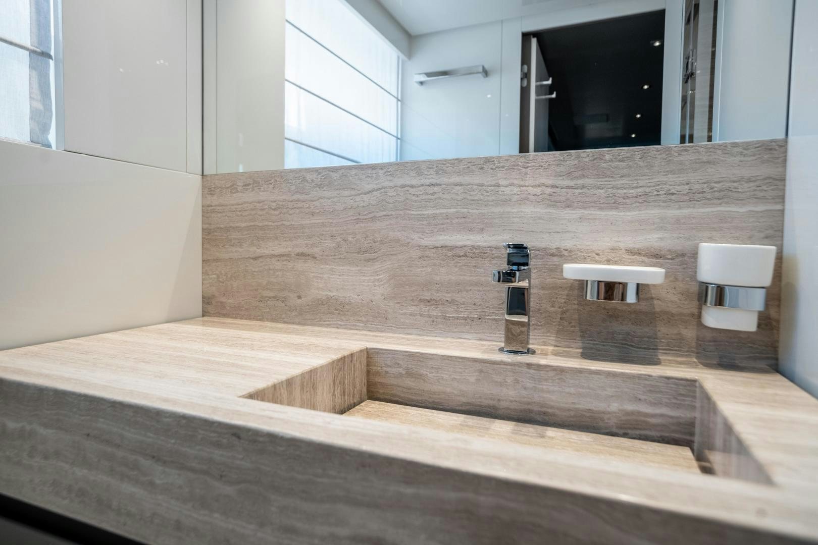 a bathroom with a countertop aboard ACE Yacht for Sale