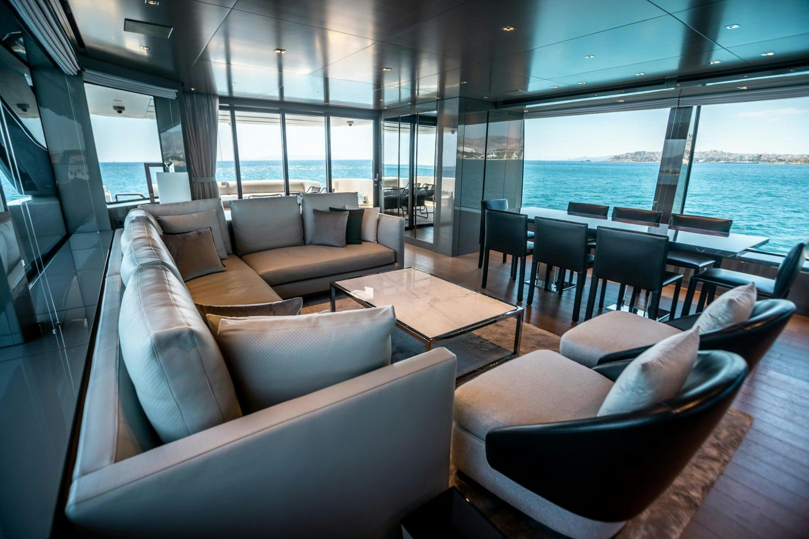 a living room with a large window aboard ACE Yacht for Sale