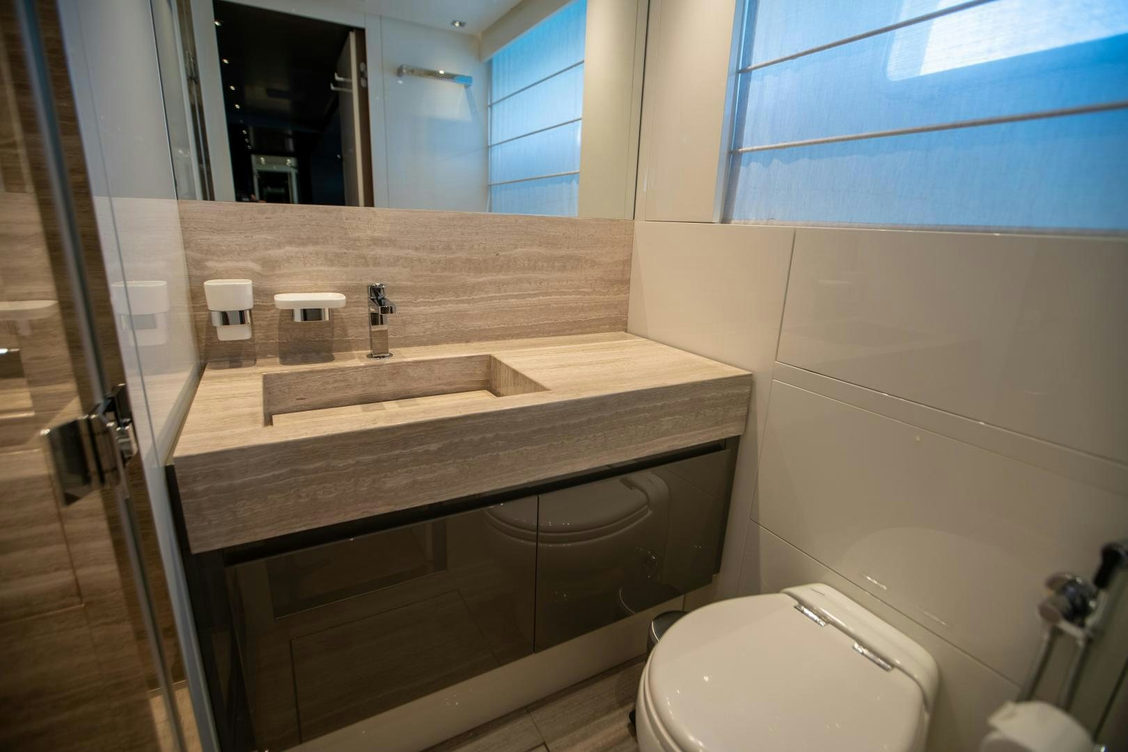 a bathroom with a sink and a toilet aboard ACE Yacht for Sale