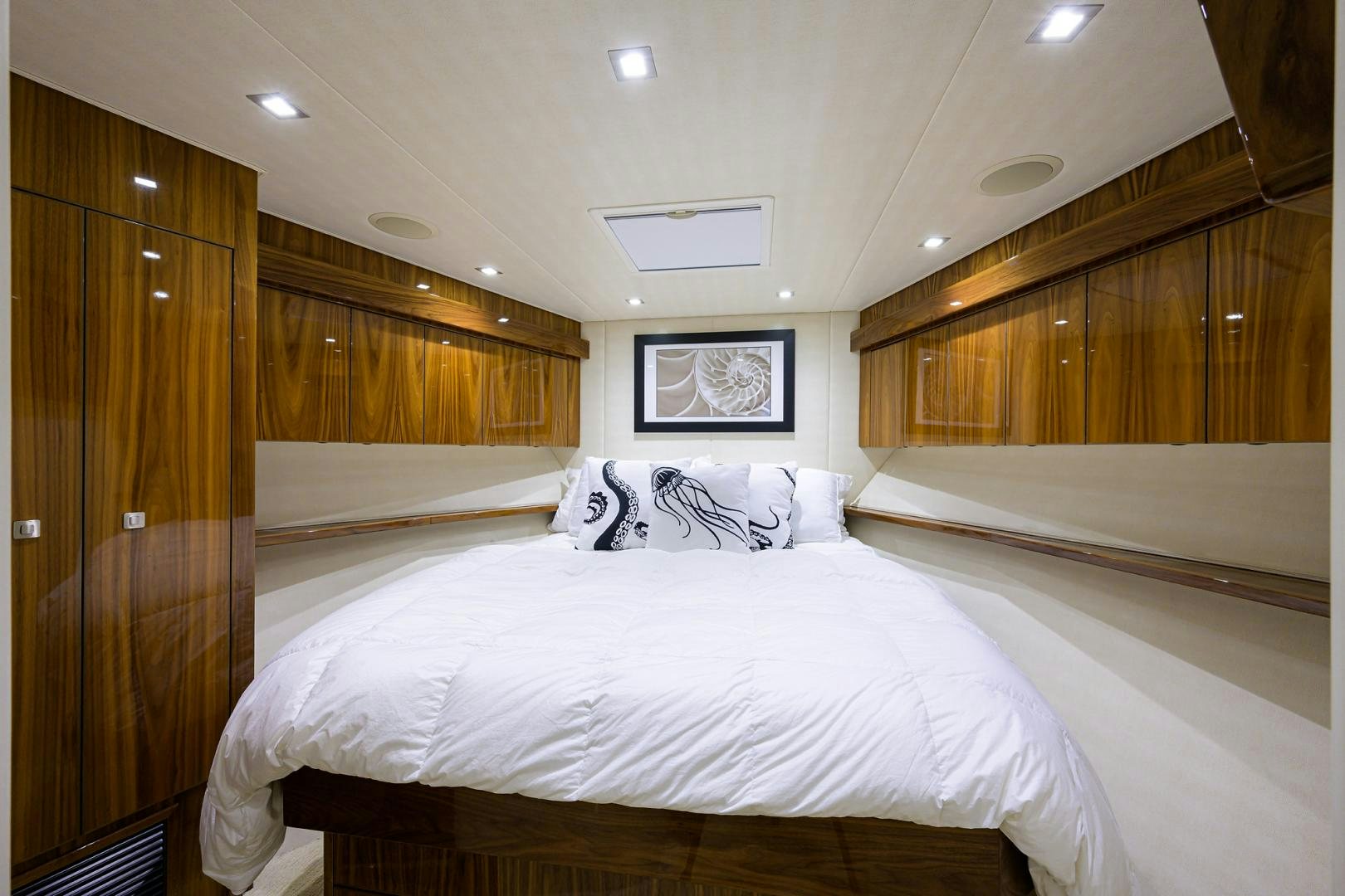 a room with a bed and a television aboard SET IN MY WAVES Yacht for Sale